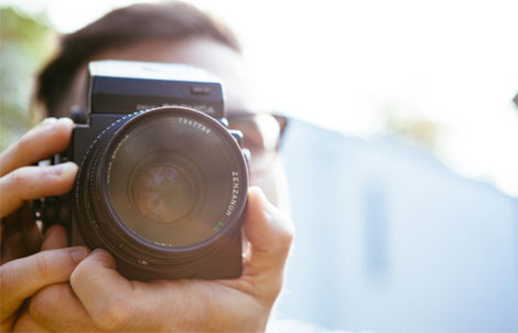 Man behind a camera